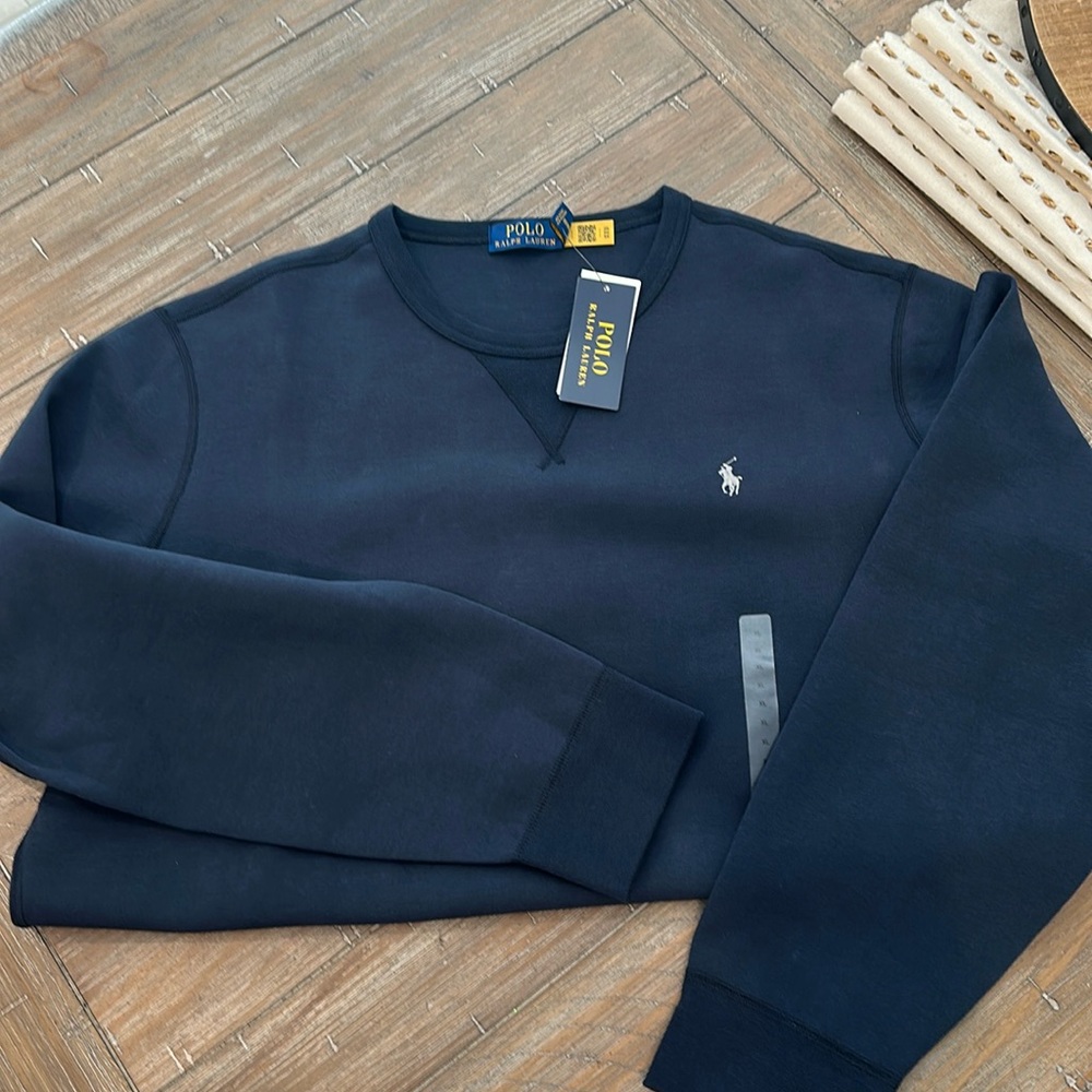Brand new with tags men’s polo crewneck sweatshirt.  Size XL navy.